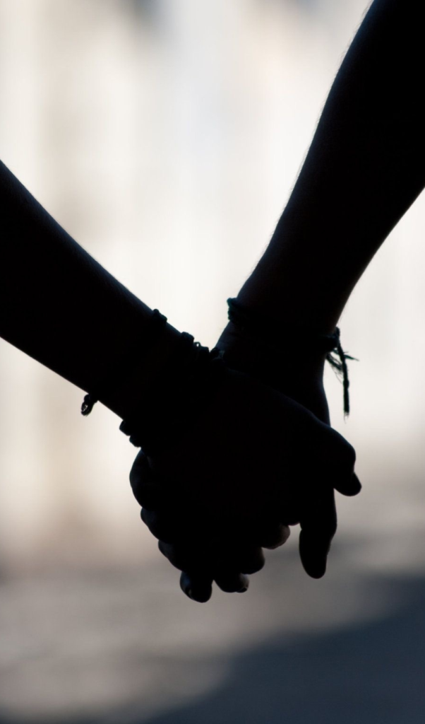 Hand holding silhouette