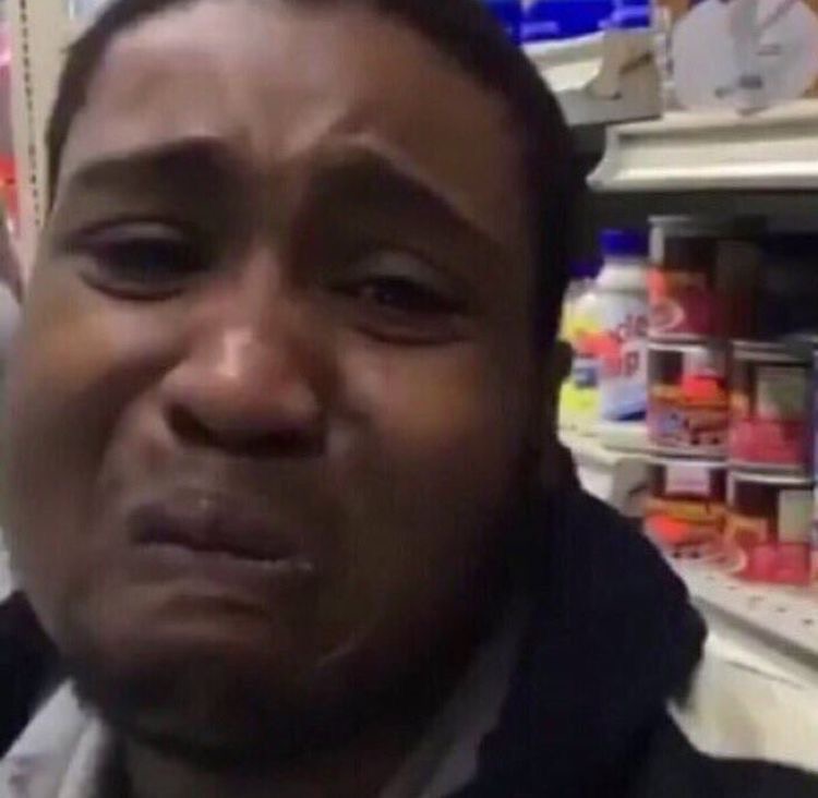photo of an emotional man in store about to cry